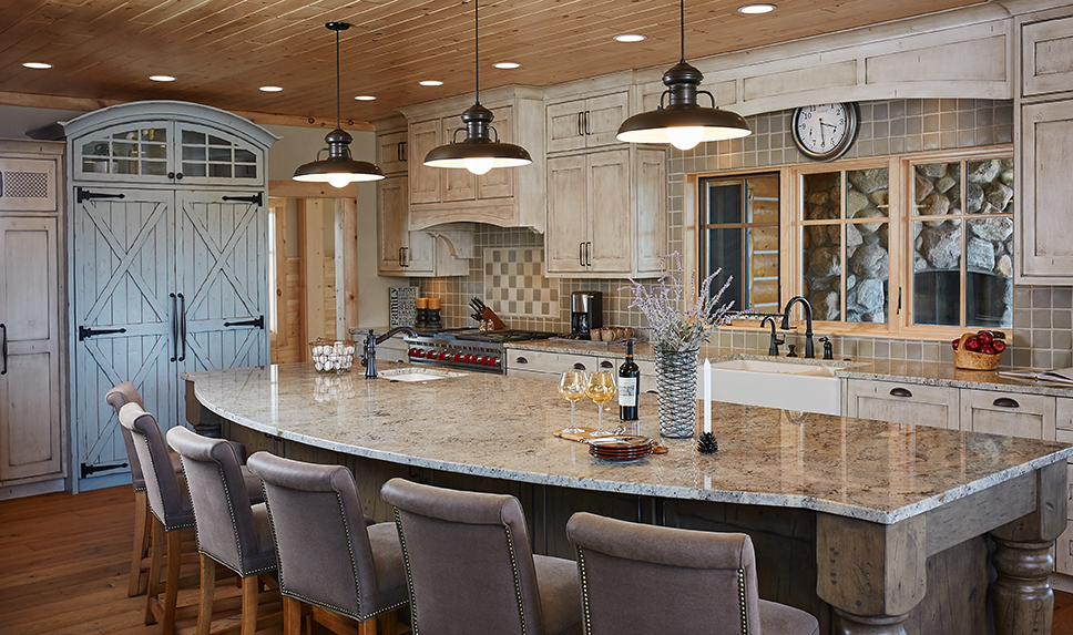 the kitchen inside a large wooden themed mansion