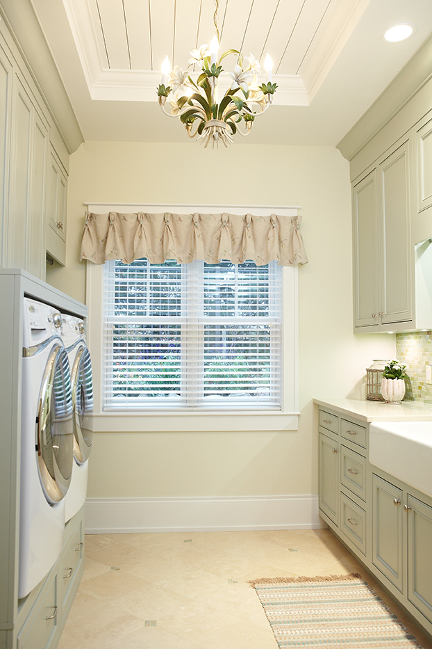 inside the laundry room of a gorgeous mansion home