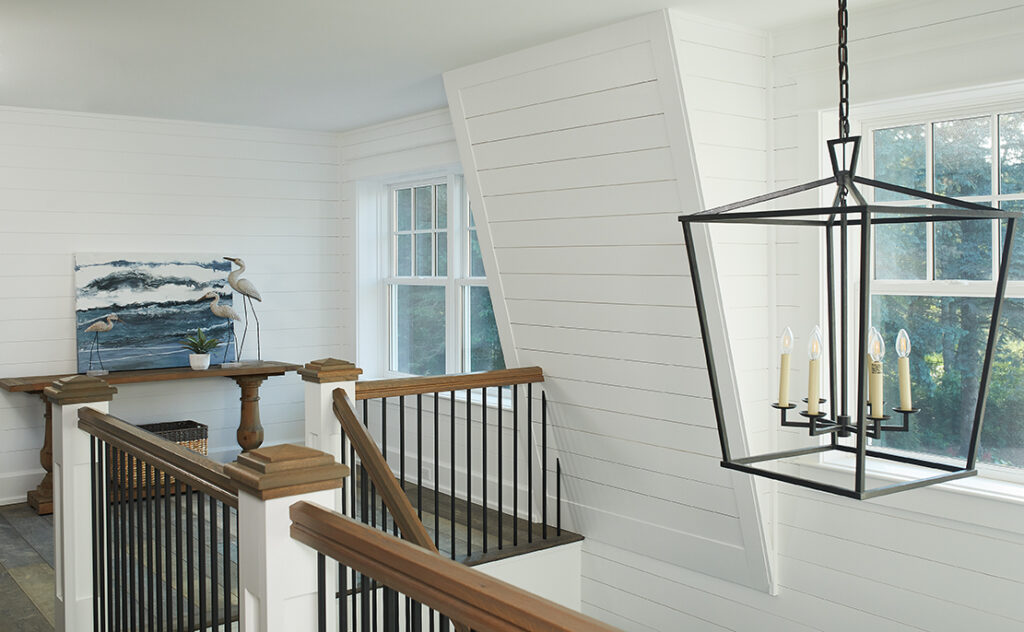 stair railing inside a beautiful lake front house