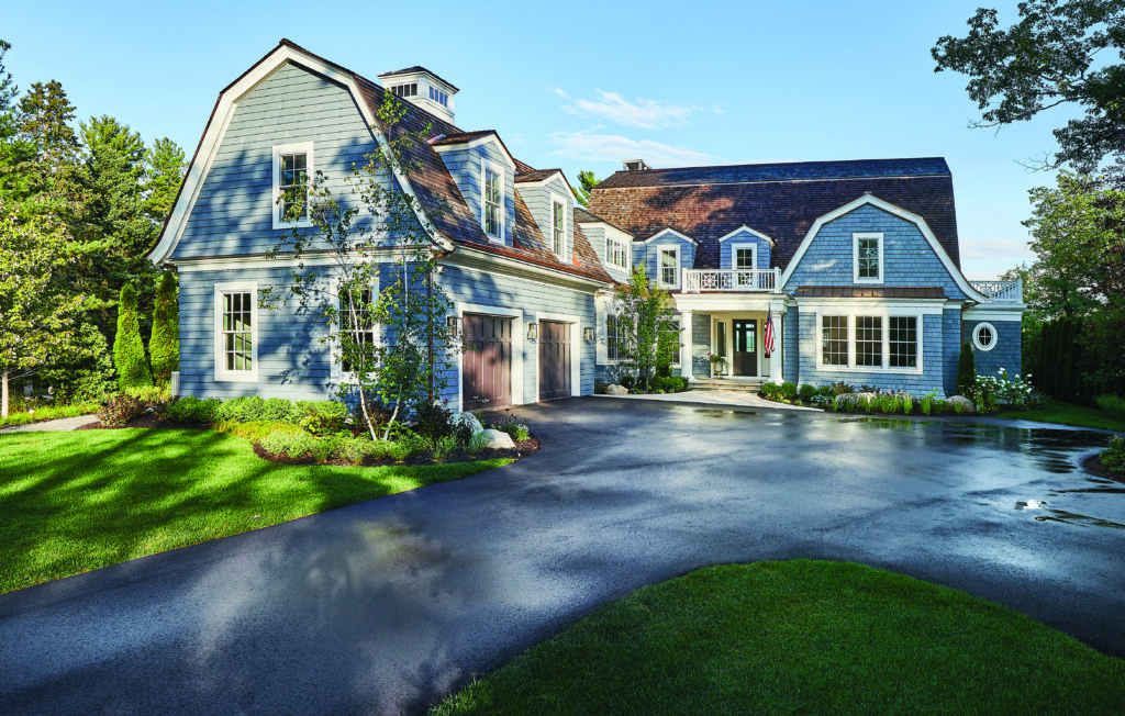 Glen Arbor lake home front exterior with blue shingle siding