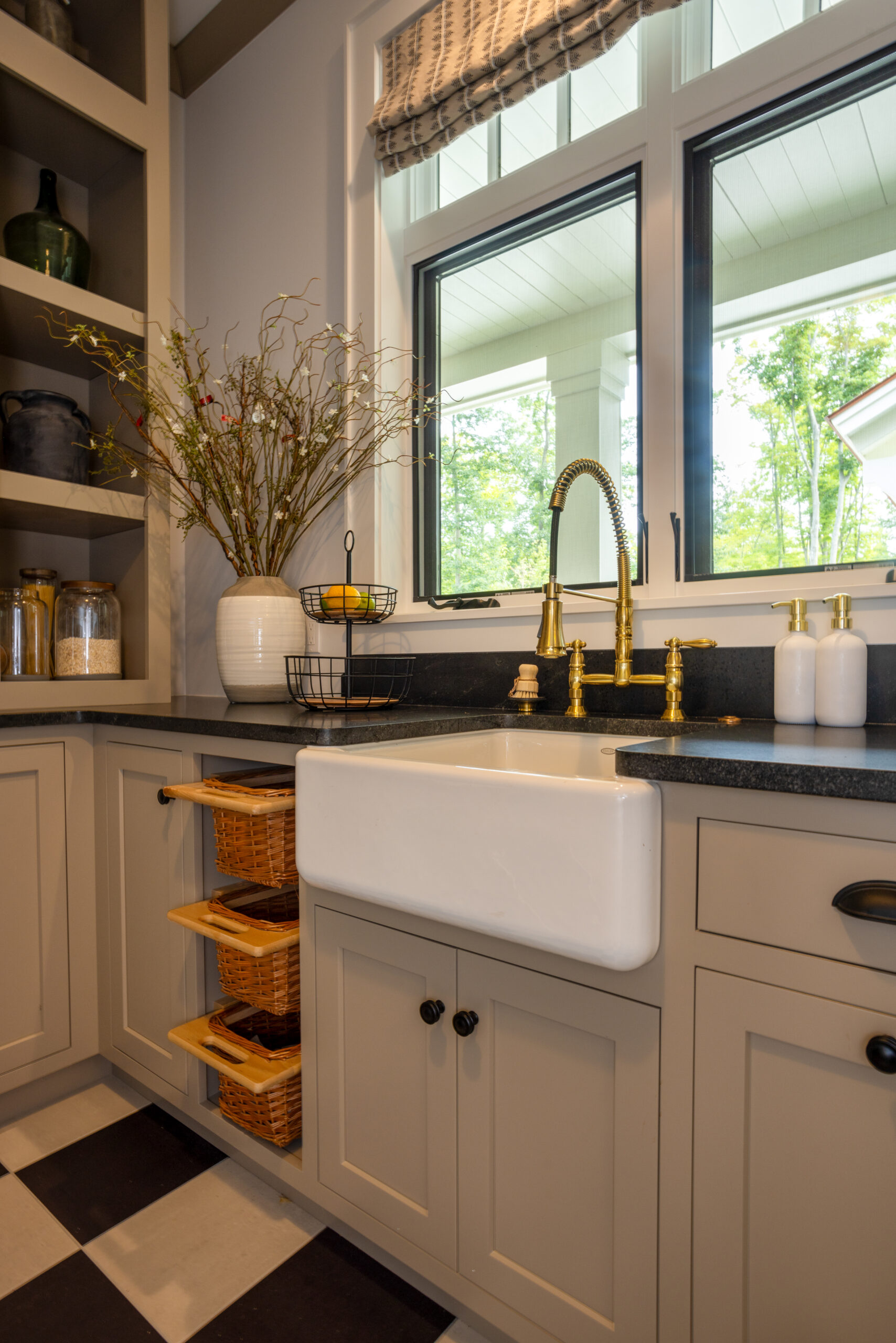 Pantry with apron sink and brass bridge faucet