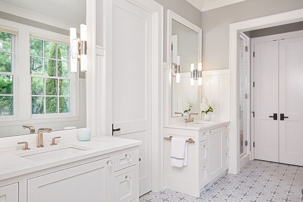 Elegant double vanity bathroom with patterned tile floor